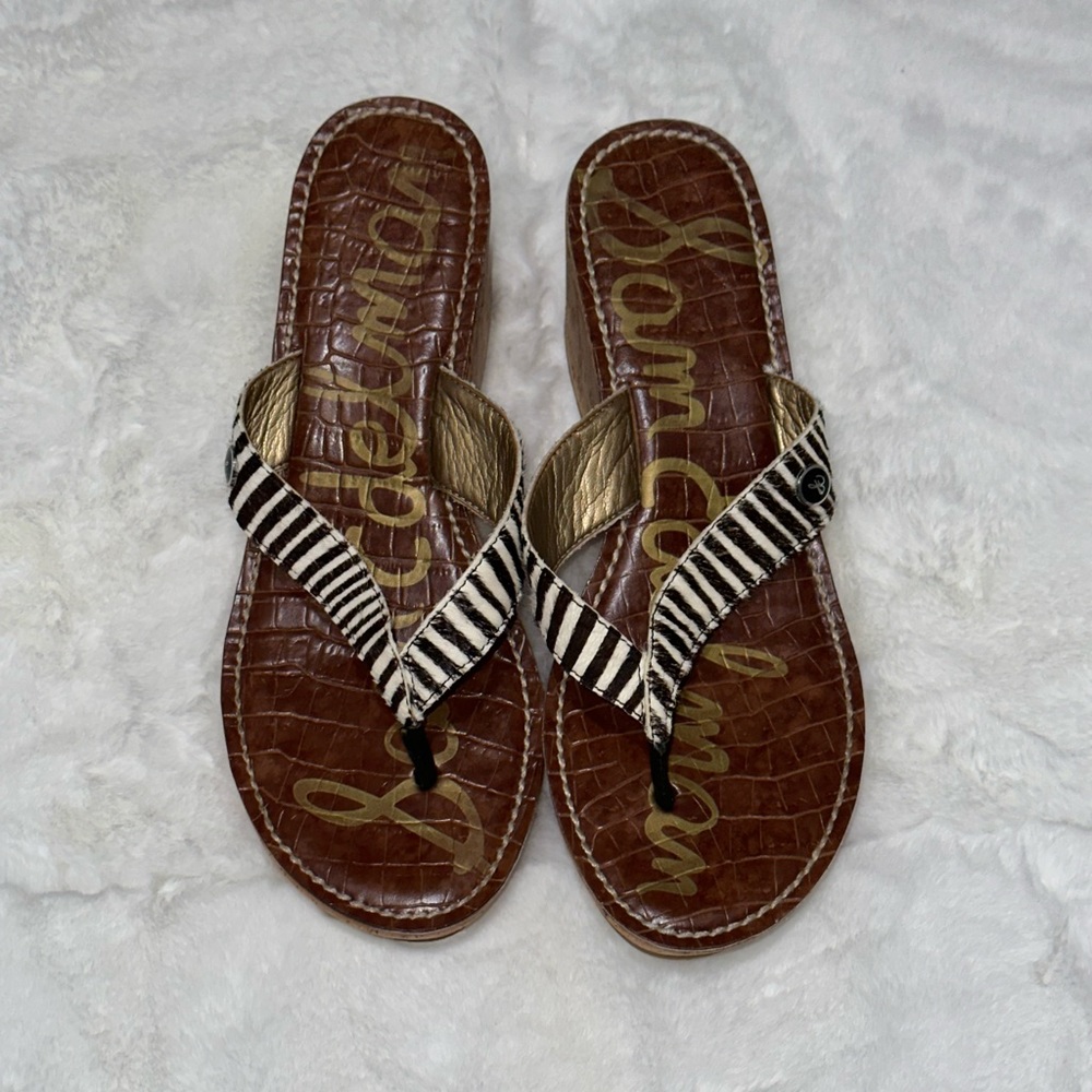Sam Edelman Women’s Calf Hair Black and White stripe wedge flip flops. Size 8